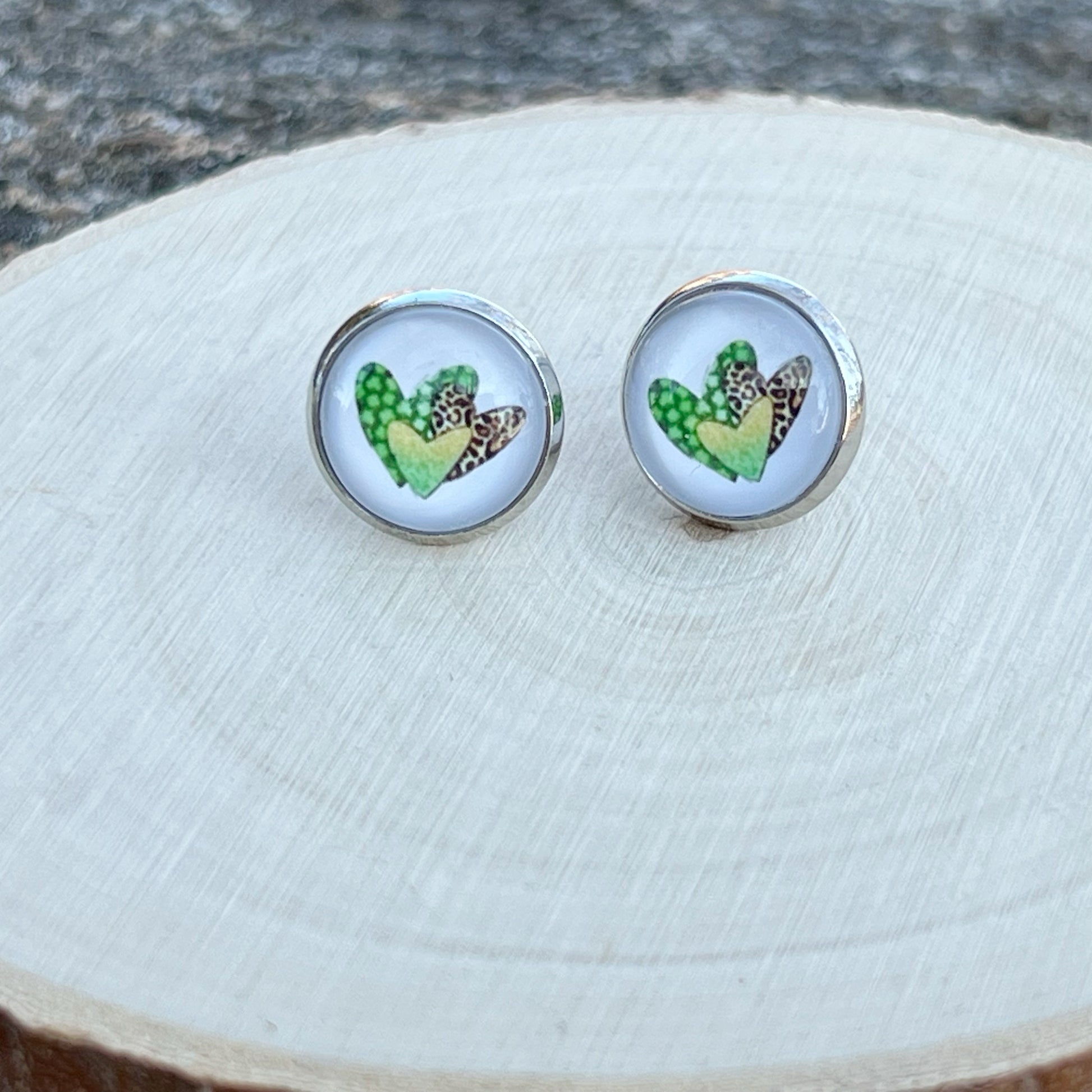 Silver Stud Earrings: Patterned Heart Design