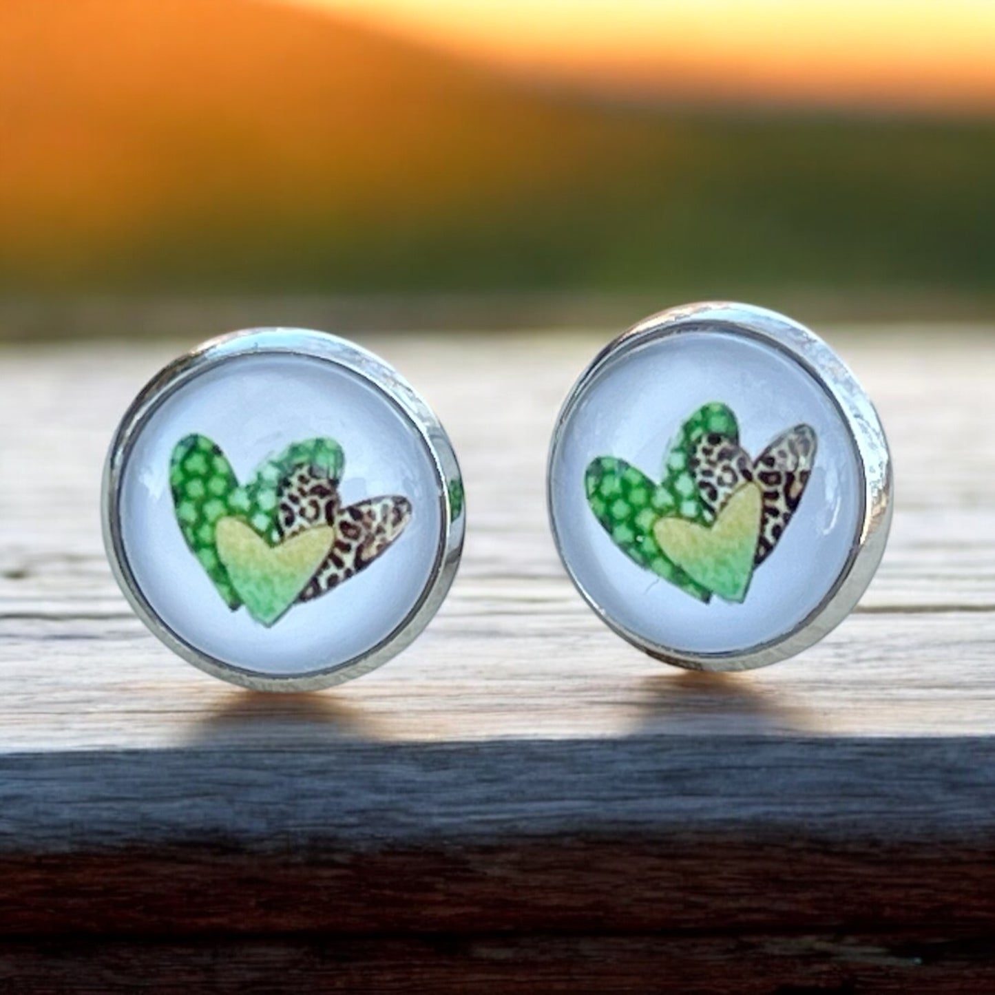 Silver Stud Earrings: Patterned Heart Design