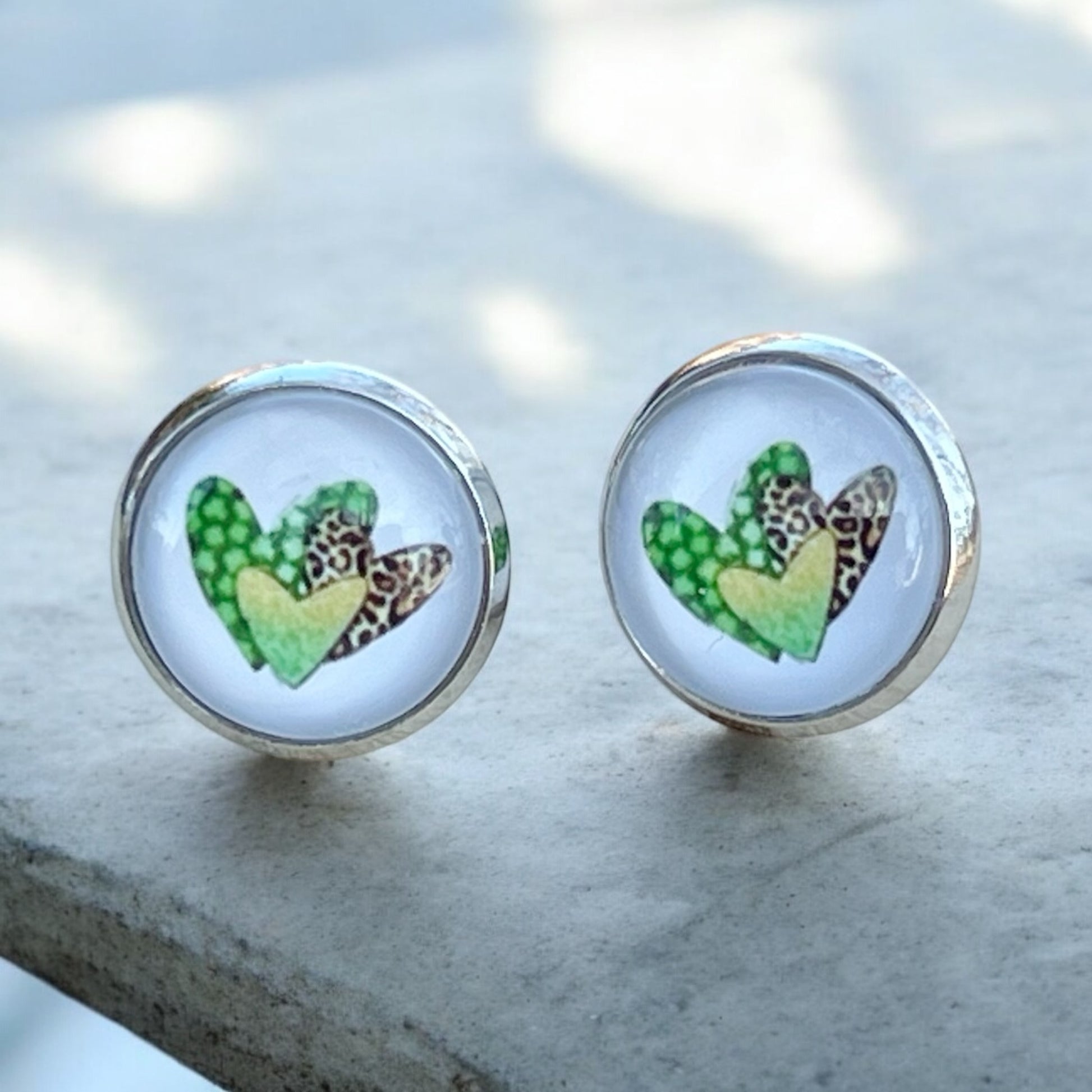 Silver Stud Earrings: Patterned Heart Design