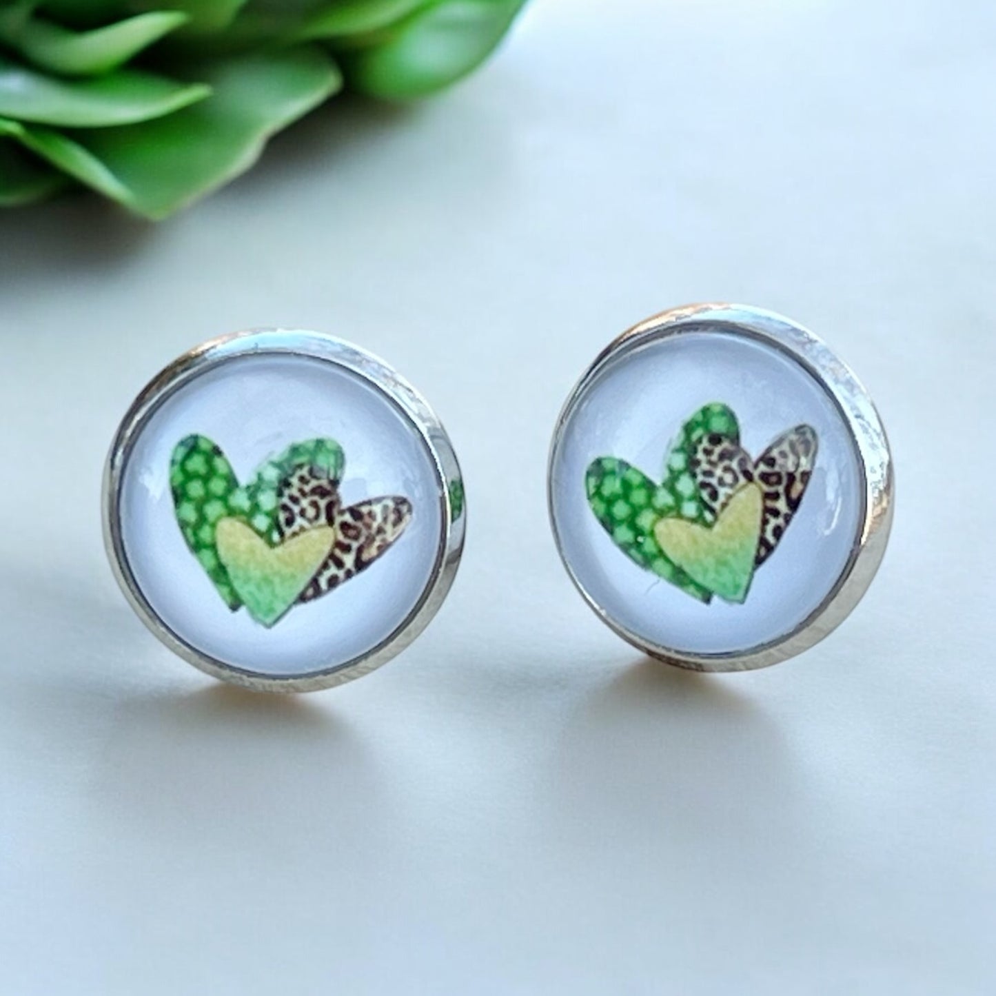 Silver Stud Earrings: Patterned Heart Design