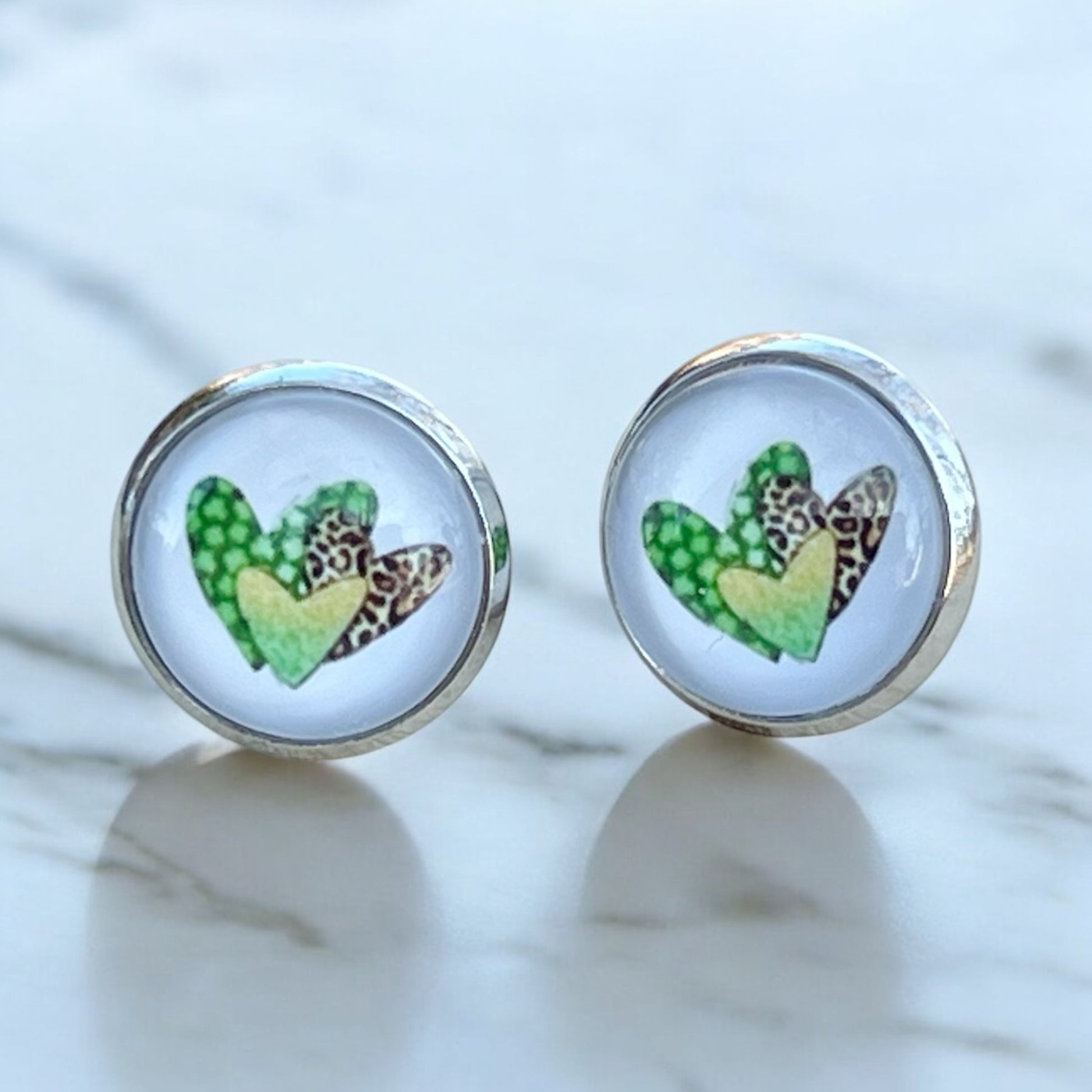 Silver Stud Earrings: Patterned Heart Design