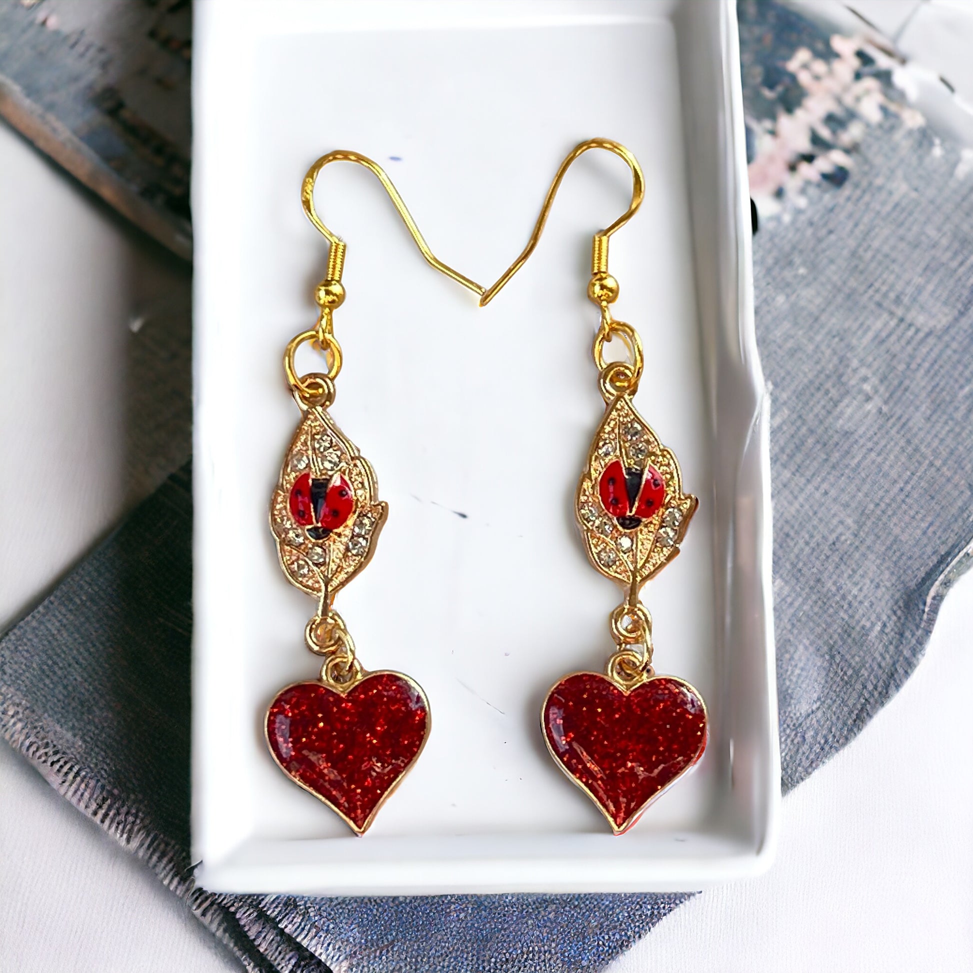 Gold Leaf with Ladybug & Red Heart Dangle Earrings: Whimsical Nature-inspired Jewelry