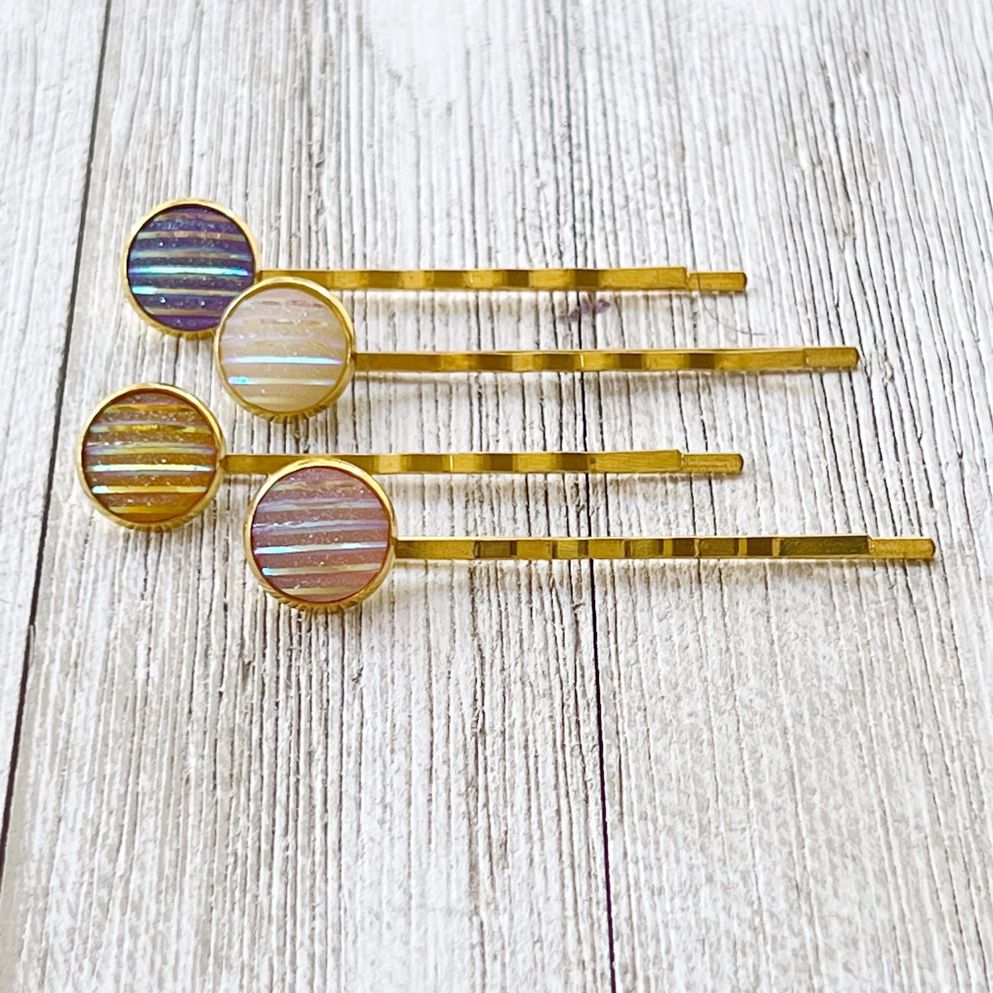 Set of 4 Gold-Toned Hair Pins: Vibrant Accents in Purple, Yellow, Pink, & White Striped Glitter Design