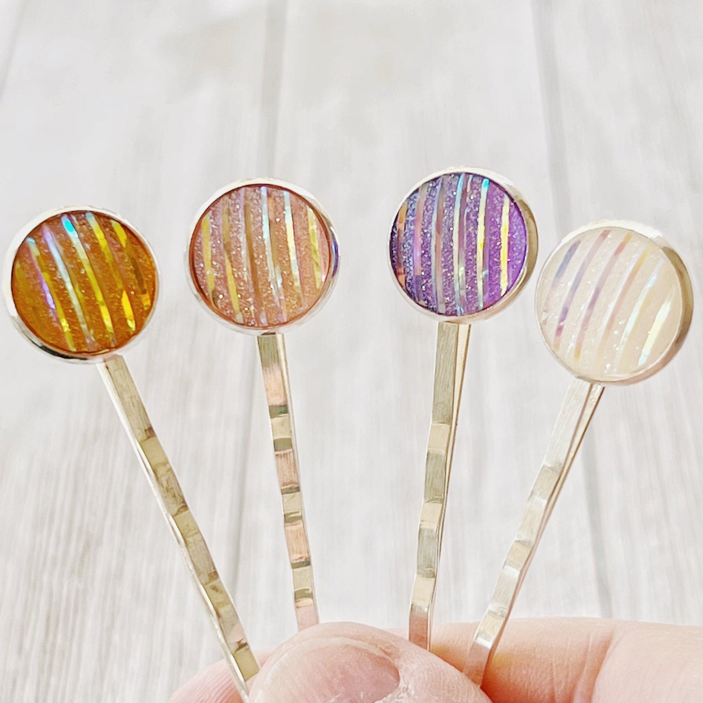 Set of 4 Silver-Toned Hair Pins: Vibrant Accents in Purple, Yellow, Pink, and White Striped Glitter Design