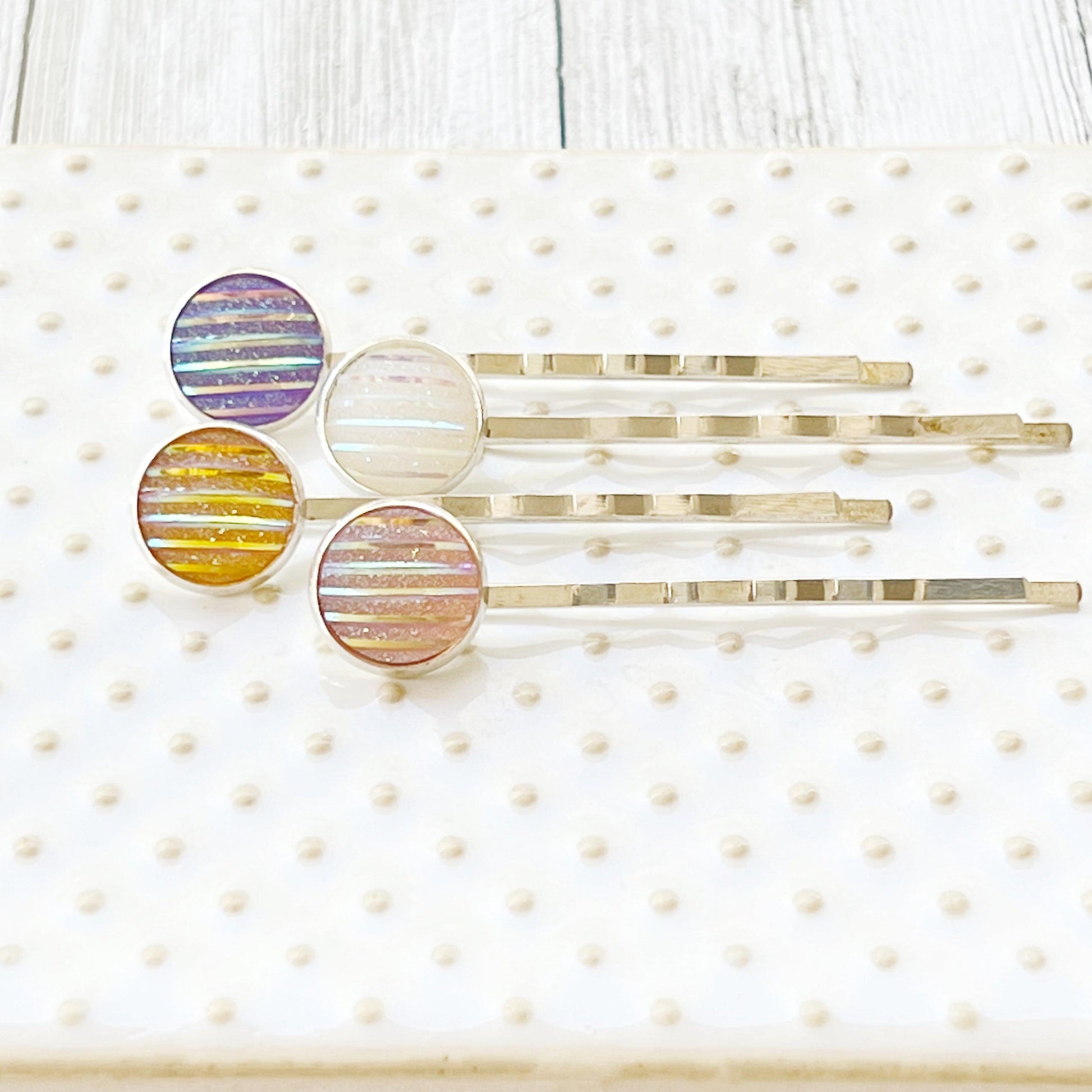 Set of 4 Silver-Toned Hair Pins: Vibrant Accents in Purple, Yellow, Pink, and White Striped Glitter Design