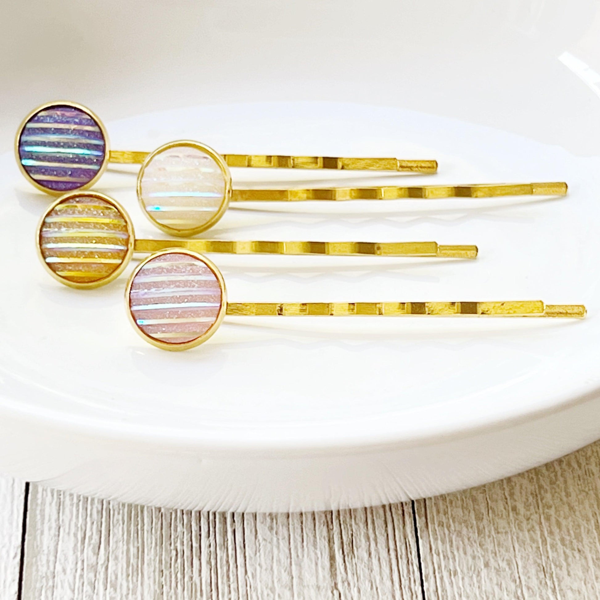 Set of 4 Gold-Toned Hair Pins: Vibrant Accents in Purple, Yellow, Pink, & White Striped Glitter Design