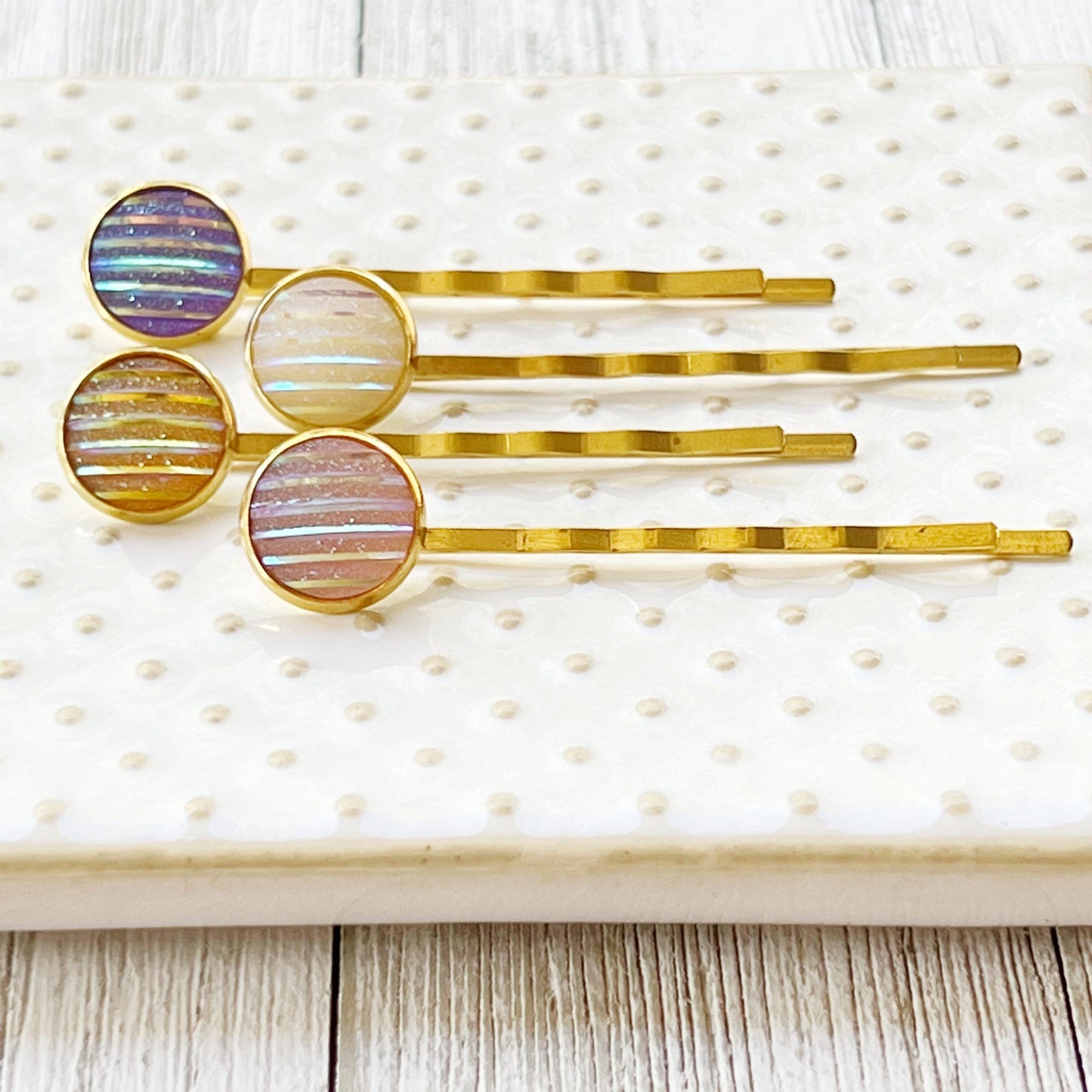 Set of 4 Gold-Toned Hair Pins: Vibrant Accents in Purple, Yellow, Pink, & White Striped Glitter Design